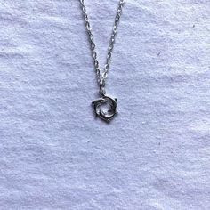 Silver circle dolphin pendent and chain.Available in 18", 20" and 24" chains.Any questions don't hesitate to drop me a message. Grunge Style Sterling Silver Jewelry Gift, Trendy Silver Hypoallergenic Charm Necklace, Silver Grunge Necklace As A Gift, Silver Grunge Necklace For Gifts, Silver Grunge Necklace For Gift, Silver Stainless Steel Grunge Jewelry, Silver Grunge Stainless Steel Jewelry, Necklace Pendent, Rock Tattoo