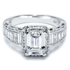 an engagement ring with baguette diamonds on it