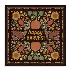 a happy harvest card with sunflowers, leaves and pumpkins on the front