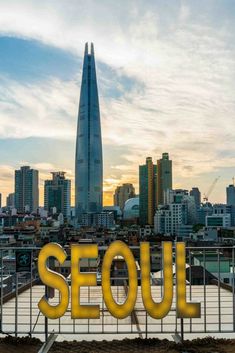 the words seoul in front of a cityscape that reads is this seoul's best cafe view?