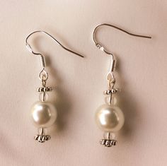 Elegant pearl bridal sterling silver earrings. Wedding, Bridal jewelry, bridesmaids gift, bridal earrings. Classic Sterling Silver Pearl Earrings With Elegant Design, Classic Silver Bridal Earrings For Formal Occasions, Formal Bridal Accessories In Pearl White, Classic Pearl Earrings With Ear Wire For Weddings, Sterling Silver Pearl Earrings For Formal Occasions, Elegant Sterling Silver Dangle Pearl Earrings, Elegant Pearl White Sterling Silver Bridal Earrings, Elegant Nickel-free Sterling Silver Bridal Earrings, Formal Pearl Bridal Earrings With Elegant Design