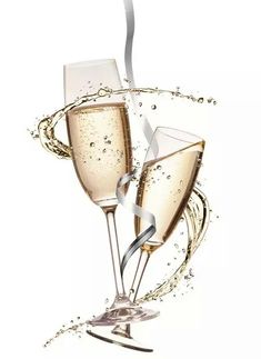 two glasses of champagne with splashing liquid