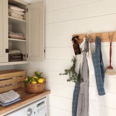 the kitchen is clean and ready to be used as a washer and dryer