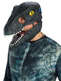 a man in a t - shirt with a mask on his face and an alligator's mouth