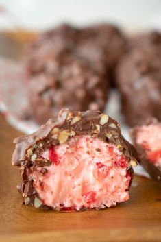 inside of cherry mash candy. Pink candy center with cherry pieces can be seen Cherry Nougat Candy, Sees Candy Rum Nougat Recipe, Joanna Gaines Cherry Mashers, Sees Candy Recipes Copycat, Thanksgiving Candy Treats, Cherry Mashers, Candy Fruit Recipes, Cherry Mash Recipe, Cherry Mash Candy