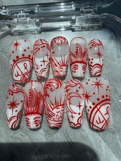 These handcrafted press-on nails feature an intricate blend of astrology-inspired symbols, celestial elements, and surrealist art. Designed with bold red linework on a translucent base, these nails offer a unique and mystical aesthetic for anyone looking to express their individuality. Each set is hand-painted with care, featuring zodiac-inspired designs, cosmic shapes, and abstract patterns that make every nail a true work of art. Perfect for those who love personalized nail art with a touch of Salvador Dali Nail Art, Roman Nail Art, Mystic Nail Art, Simple Unique Nails, Moon Sun Nails, Tarot Nail Art, Aries Inspired Nails, Intricate Nail Art, Zodiac Sign Nails