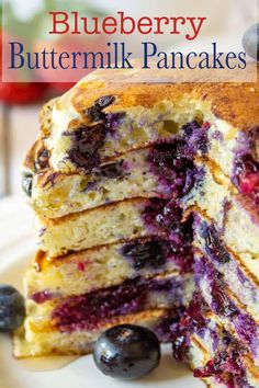 blueberry buttermilk pancakes stacked on top of each other