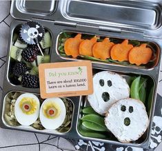 a bento box filled with lots of food and veggies to eat for halloween