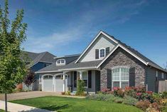 a house with landscaping in the front yard