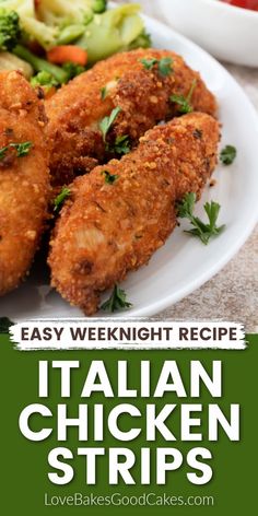 italian chicken strips on a white plate with broccoli, carrots and celery