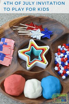 fourth of july party ideas for kids with stars and stripes on the tray, including cookies