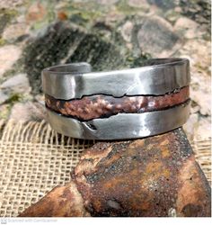 "* Hammered and patinaed copper inlay in stainless core * 1.03\"x 0.12\" (26mmx3mm) wide and thick. 0.75\" Wide is available on the option. *Brushed. If you want Shiny Polished, leave shiny on the Note. *Measure your whole wrist and mark it on the option." Artisan Silver-colored Copper Cuff Bracelet, Artisan Silver Copper Cuff Bracelet, Artisan Silver Cuff Bracelet In Copper, Silver Artisan Cuff Bracelet In Copper, Rustic Cuff Jewelry For Gifts, Rustic Cuff Jewelry As A Gift, Rustic Cuff Jewelry Gift, Artisan Bronze Copper Cuff Bracelet, Handmade Copper Cuff Bracelet In Silver