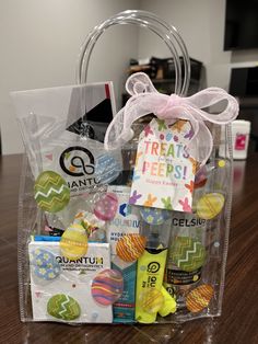 a clear bag filled with candy and treats