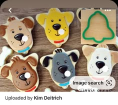 some cookies that are shaped to look like dogs and bears on a table with the words image search below them