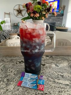 a cup with some candy in it sitting on a counter