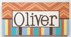 an art piece with the word oliver painted in brown, blue, and orange