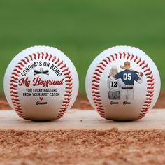 two baseballs sitting on top of a field with the names of their respective teams