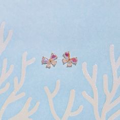 There's always been a rainbow fluttering over your head. Our Kaleidoscope Butterfly Studs are so petite and cute. They reflect an array of colors that are so easy to get lost in. 18k gold plated, 18k rose gold plated, or rhodium plated over brass with a protective coating Cubic zirconia stones Sterling silver posts and butterfly backings Approx. 8mm width Shop our entire In the Garden Collection here Kaleidoscope Butterfly, Necklace Chain Lengths, Jewelry Pins, Brass Pendant, Wrap Rings, Jewelry Companies, Rose Gold Color, A Rainbow, Jewelry Plate