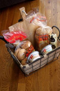 a basket filled with bread and other food items