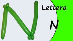 the letter n is made up of green balloons