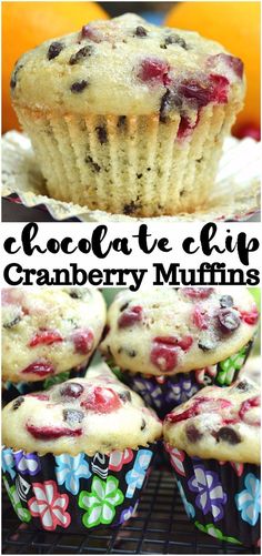 chocolate chip cranberry muffins on a cooling rack with oranges in the background