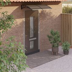 two potted plants sitting outside of a building with an awning over the door