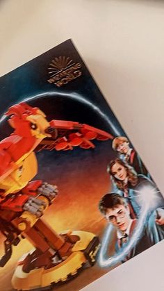 the lego movie poster is displayed on a table