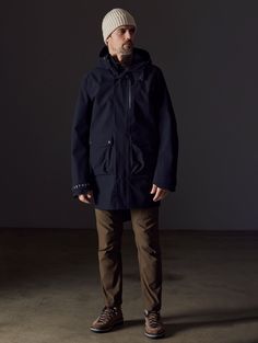 We obsess over the end use of our products because we wear them too. Like our Anders Rain Jacket, seam-sealed, waterproof, and made of bluesign® certified fabric, it’s a resilient yet breathable trench that’s ready to face the elements. Bring this easy-to-pack, versatile layer along for your next adventure. Please note: Built with room for layering. For a classic, tailored AETHER fit, we recommend sizing down. Functional Outerwear With Detachable Hood For Work, Waterproof Techwear Outerwear For Work, Techwear Outerwear With Detachable Hood For Work, Functional Winter Raincoat For Workwear, Functional Winter Raincoat For Work, Functional Winter Workwear Raincoat, Techwear Outerwear With Functional Pockets For Work, Navy Weatherproof Functional Outerwear, Navy Functional Weatherproof Outerwear