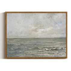 a painting hanging on a wall above the ocean