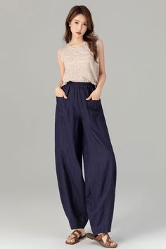 Navy linen wide leg pants are a must-have for a chic and comfortable summer look. The lightweight fabric and loose fit make them perfect for warm weather, while the navy color adds a touch of sophistication to any outfit. Pair them with a simple white tank top and sandals for a casual day out or dress them up with a blouse and heels for a more polished ensemble. 💙 

SKU 4907

#linenpants #widelegpants #navyfashion #summerstyle #Xiaolizi Blue Linen Wide Leg Pants, Solid Color Linen Wide Leg Harem Pants, Blue Linen Ankle-length Wide Leg Pants, Wide Leg Linen Harem Pants, Baggy Blue Linen Pants, Baggy High-waisted Linen Wide Leg Pants, Baggy Wide Leg Linen Pants, Best Dress Shoes, Long Linen Pants