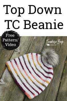 a crocheted beanie with text that reads, top down t c beanie