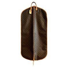 A wonderful Louis Vuitton Garment Bag - holds several shirts and suits with a convenient handle for carrying after folded. The bag also has a hook for hanging over any door for easy access. A leather and marked "LV' I.D. tag is included . Travel with style and confidence. very chic and sophisticated. Wardrobe Armoire, Garment Bag, Easy Access, Louis Vuitton Monogram, Favorite Things, Louis Vuitton, Monogram, Confidence, Brass