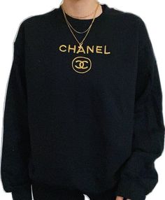 Oversized Black Sweater With Embroidered Logo, Black Embroidered Logo Crew Neck Sweatshirt, Black Crew Neck Sweatshirt With Embroidered Logo, Oversized Black Sweatshirt With Embroidered Logo, Gold Long Sleeve Sweatshirt For Fall, Gold Long Sleeve Sweatshirt For Winter, Gold Crew Neck Sweatshirt For Fall, Gold Crew Neck Sweater For Fall, Chanel Crewneck