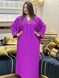 تصميم ذات طابع افريقي له مميزات يلبس في داخل وخارج البيت Long Sleeve Purple Party Kaftan, Multicolor Tunic Dress For Eid, Pink Beach Dress For Eid, Purple Maxi Dress For Eid, Traditional Long Sleeve Purple Maxi Dress, Traditional Purple Long Sleeve Maxi Dress, V-neck Purple Kaftan For Party, Traditional Long Purple Maxi Dress, Traditional Long Purple Dress