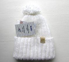 A classic ribbed hat with turn-up brim, hand knitted in a soft easy to care washable acrylic yarn in classic white, with a handmade pompom. This will fit most size heads.. Machine washable at 40c, tumble dry on a low heat. Ribbed Hat, Chunky Hat, White Acrylic, White Acrylics, Classic White, Acrylic Yarn, Hand Knitting, Caps Hats, Accessories Hats