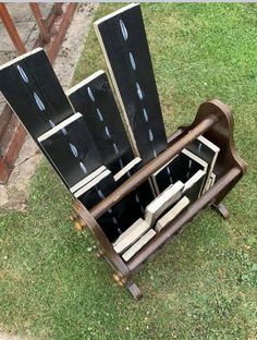 an old wooden chair with several chairs in it