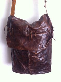 "Brown Women's handmade handbag, from real leather, soft and genuine leather, recycling leather, fashionable bag, crossbody handbag, designer bag, stylish bag, modern bag, new collection, fringe bag, with decoration, has size - large. Made by Charlize & Kyle Couture. Women's handmade handbag, from real leather; leather is soft and genuine; leather is recycling, has a few spots, strong and durable leather; this gives the collection a special vintage style. Bag is fashionable, big comfortable Vintage Style Bag, Unique Handbag, Brown Boots Women, Handmade Handbag, Modern Bag, Fringe Bags, Handmade Handbags, Handmade Bag, Recycled Leather