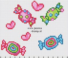 cross stitch pattern with flowers and fish on the side, in different colors to make it look