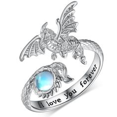 PRICES MAY VARY. Dragon Ring for Women: This Moonstone Dragon Ring is inspired by a dragon, which symbolizes strength, good luck and protection. Moonstone represents the lover's stone, and treat it as a token of beautiful love. Perfect earrings for daily wear, designed specifically for those who love dragon. Sterling Silver Dragon Rings Material: The Adjustable Dragon Ring is made of 925 sterling silver. Lead-free and nickel-free, Hypoallergenic and safety for sensitive skins women. Moonstone Dr Claughdaugh Ring, Dragon Ring Women, Dragon Wedding Rings, Fantasy Jewelry Ring, Dragon Wedding Ring, Spinning Rings Woman, Moonstone Dragon, Dragon Goddess, Relationship Rings