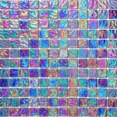 colorful glass tiles with different colors and patterns on them, all in the same pattern