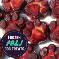 frozen dog treats are in the shape of heart shaped dogs'paw prints, with text overlay that reads frozen p & j dog treats