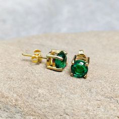 Main Stone : Lab Created Emerald Stone Color : Green Stone Size : 6 mm Stone Shape : Round Metal : 925 Sterling Silver Plating : Silver / 14 Caret Gold / Rose Gold Side Stone : Non Setting type : Prong setting Occasion : Wedding ,Party, Anniversary, Valentine's Day, Daily Style : Classic Earring Type : Stud, Item Type : Stud Earrings If You Have Any Questions, Please Feel Free Contact Us through Etsy Message Service If you want to make jewelry of some other design or other types please contact u Round Earrings With Prong Setting For May Birthstone, Classic Round Earrings For May Birthstone, Classic Round May Birthstone Earrings, Green Prong Set Earrings As Gift, Green Prong Setting Earrings For Gift, May Birthstone Round Cut Earrings Gift, Green Earrings With Prong Setting As Gift, Emerald Round Cut Earrings For Gift, Hallmarked Round Emerald Earrings