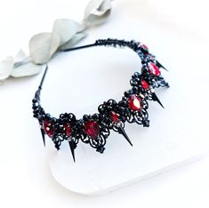 ❤ Beautiful black and red crystals bridal crown with black spikes, gothic tiara for your special day! Spiked crown made of elegant black and red crystals, black spikes and black jewelry wire. ❤ Gothic crown is the perfect wedding hair accessory for the bride. ❤ Perfect for brides and bridesmaids! It is a perfect way to add glamour and sparkles to your wedding updo. ❤ Handmade ❤ You are welcome with custom inquiries Evil Queen Crown, Spiked Crown, Gothic Tiara, Gothic Headpiece, Gothic Crown, Crystals Black, Crown Black, Black Crown, Queen Crown