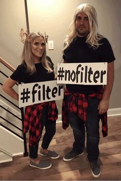 two people dressed in costumes holding up signs that say no filterr and no filterr