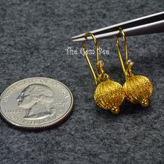 DESCRIPTION: Thank you for coming in! Spectacular 18K solid yellow gold earrings with old stock handmade high karat solid gold lantern earring pendants and rose cut diamond accents! Looks much much nicer in person! WEIGHT: 2.85 Grams DIMENSION: 1.35 Inch Total Length. MATERIAL: 18K Solid Yellow Gold, Diamond Traditional 14k Gold Dangle Jewelry, Heirloom Gold Dangle Earrings, Gold Diamond Cut Earrings Fine Jewelry, Gold Fine Jewelry Earrings For Celebration, Traditional Gold Diamond Cut Earrings, Exquisite Gold Filigree Earrings, Traditional Round Diamond Cut Earrings, Heirloom Gold Earrings For Gift, Antique Gold Earrings With Diamond Cut