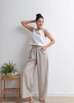 "★★FEATURES 100% Linen Two side pockets Adjustable drawstring Elastic, high waisted pants Pleated waist details Wide leg linen pants Long linen pants Perfect for Summer, Spring, Autumn ★★ Model Size Height approx 162 cm (5′ 4″) Bust 84 cm (33\") Waist 66 cm (26\") She wears size XS. ★★ Bespoke Order Service If you Request other color Request the length Your height is not between 155 cm- 172 cm Your weight is over 75 kg I can do it for you, It will need some extra fee depending on on your need. C Linen High Waisted Pants, Women Loose Pants, Flowy Linen Pants, Linen Summer Outfits, Linen Palazzo Pants, Linen Pants For Women, Long Linen Pants