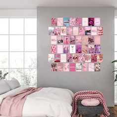 a white bed sitting next to a window covered in lots of pink pictures on the wall