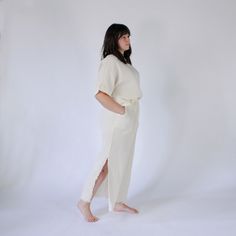 This is loungewear without limits. Comfortable and classy - this one-sized boat top is ideal for those looking to feel luxurious at home, on the town, with glam or on the go. Made with a luxe fabric composed of doubled Turkish muslin cotton. The crinkle muslin texture is incredibly soft on the skin, and feels lightweight, yet substantial when worn. Designed in an oversized style, the Crinkle Crop Top has half sleeves, with a cropped cut at the waist, and a boat neckline. Available in two color s Free Feeling, Slouchy Pants, Upcycled Bag, Sustainable Fashion Brands, Oversized Style, Boat Neckline, Color Stories, Muslin Cotton, Linen Clothes