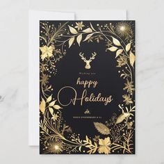 a black and gold holiday card with golden foil flowers, leaves and a deer's head