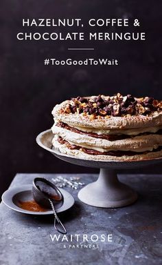 a cake sitting on top of a table next to a plate